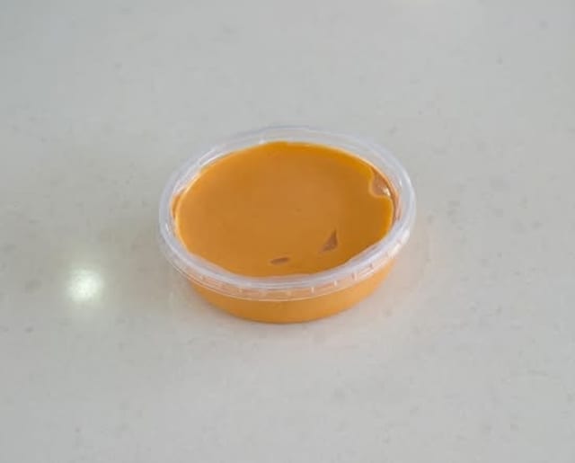 8oz Spicy Sauce.